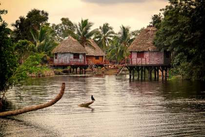 Traditional Cuban houses on the water, Guama, Cuba