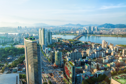Seoul Skyline with bridge over Han River dividing the city